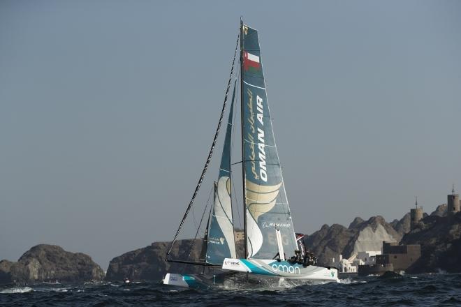 The fleet racing close to the shore and historic town of Mutrah - Extreme Sailing Series © Lloyd Images http://lloydimagesgallery.photoshelter.com/