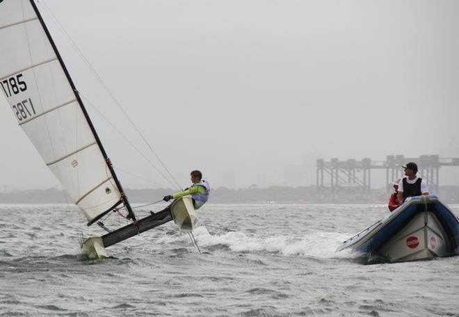 Darren Bundock coaching young Bailey Hord from Mannering Park - Kurnell Catamaran Club Youth Regatta © Leanne Gould