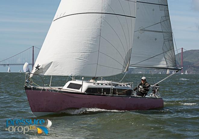 Steve Buckingham's Black Soo Starbuck Looking pretty in pink.... At least on port side - Single-handed Sailing Society Corinthian Race © Erik Simonson www.pressure-drop.us http://www.pressure-drop.us