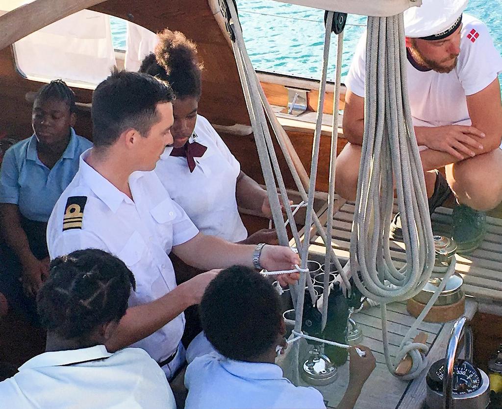 Two Danish Navy Sail Training Yachts, the THYRA and SVANEN, will sail in the regatta. Here, Lt. Commander Christian Anderson of the THYRA gives local school children a tour and shows them how to tie nautical knots.  © Dean Barnes