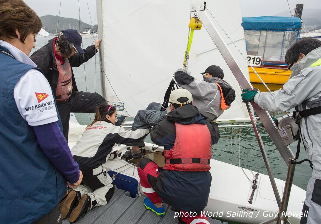 World Sailing Paralympic Development Programme, Hong Kong. Stepping into a boat is not always an option. photo copyright Guy Nowell / World Sailing taken at  and featuring the  class