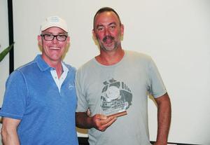 Norwood Smith, Vice President, Sales & Marketing, Scrub Island Resort, Spa & Marina presents Matt Barker's classic yacht, The Blue Peter with a beautiful trophy for 2nd in CSA cruising - BVI Sailing Festival photo copyright Todd VanSickle / BVI Spring Regatta http://www.bvispringregatta.org taken at  and featuring the  class