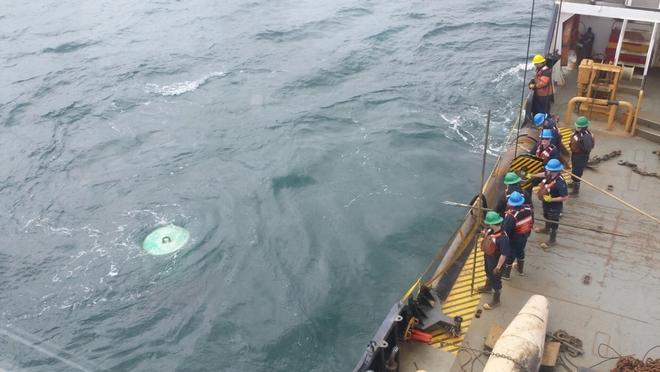 The crew of Coast Guard Cutter Ida Lewis observe a submerged buoy in the water off Block Island, Rhode Island on April 24, 2017. The Ida Lewis is a 175-foot buoy tender homeported in Newport, Rhode Island. © Patrick Morkis