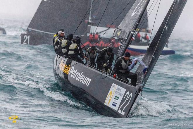 Peninsula Petroleum won today's second race in torrential rain - RC44 Sotogrande Cup © Martinez Studio