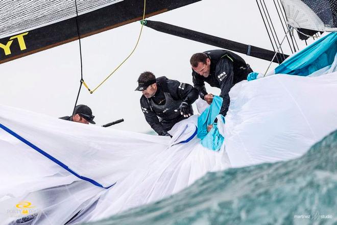 Team Nika retrieve their kite after a poor spinnaker drop - RC44 Sotogrande Cup © Martinez Studio