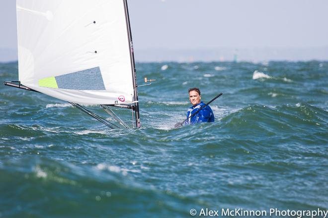 Andrew Giles on Tijuana Taxi from Lake Boga, Lake Cullulleraine. Almost disappearing behind some of the big waves on the Bay today - RS Aero Australian Championship ©  Alex McKinnon Photography http://www.alexmckinnonphotography.com