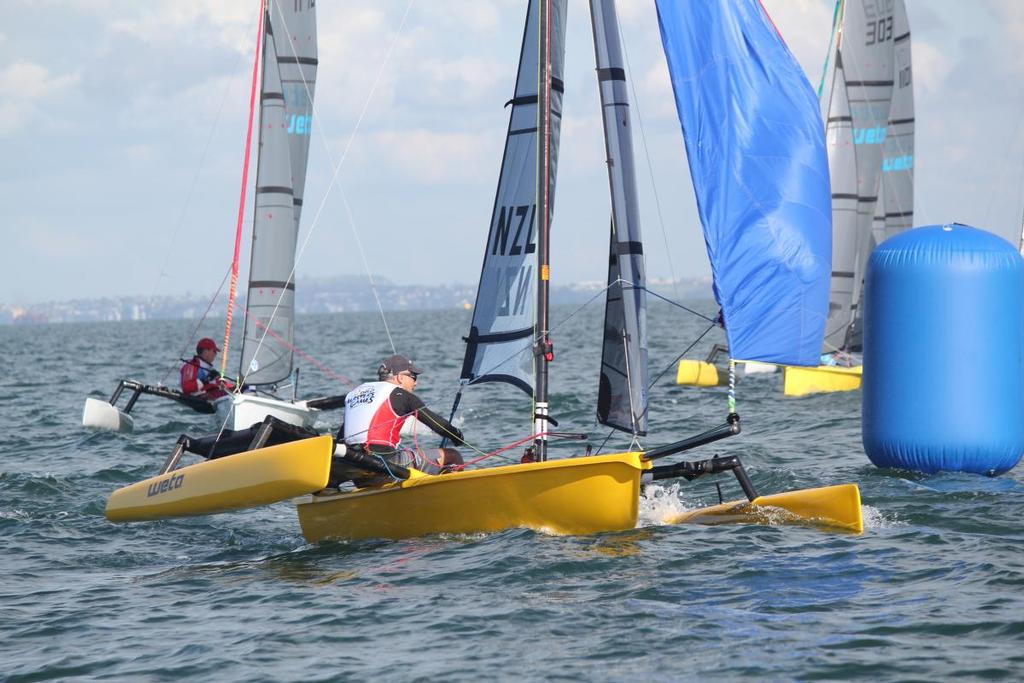 Predictwind's Jon Bilger sailing on Day 4 of the World Masters Games in the single handed Weta division photo copyright Yachting New Zealand taken at  and featuring the  class