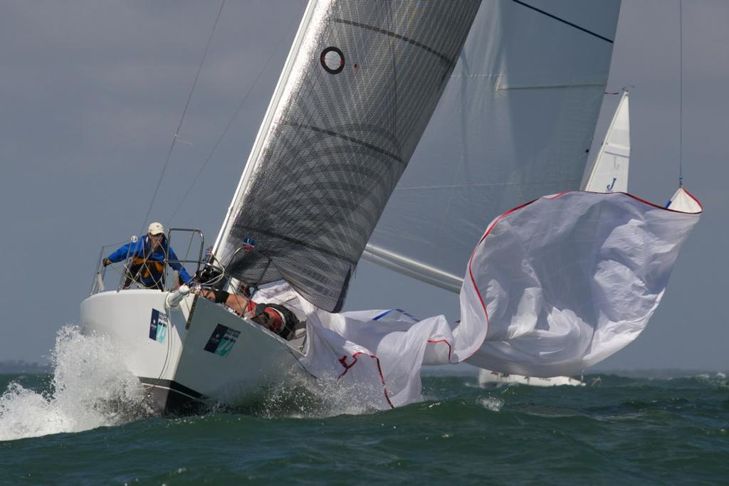 A J/105 goes for a fast spinnaker drop in monster conditions offshore during Day 2 of Sperry Charleston Race Week 2017.  © Meredith Block/ Charleston Race Week http://www.charlestonraceweek.com/