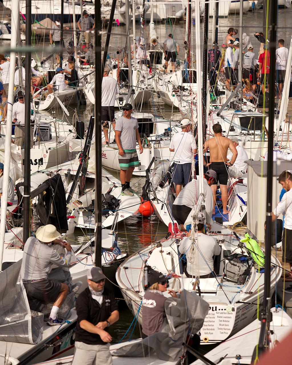 It’s organized chaos at Charleston Harbor Resort & Marina and the College of Charleston Sailing Center with hundreds of boats tied up in a web of knots for Sperry Charlesto Race Week 2017. Amazingly, it takes just a few minutes for all of them to slip out of their spots and head off to the races. © Meredith Block/ Charleston Race Week http://www.charlestonraceweek.com/