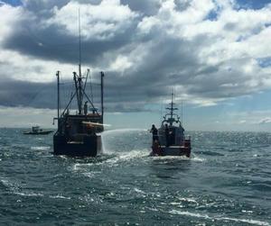 A 42-foot boat crew from U.S. Coast Guard Station Chatham help put out an engine room fire on a fishing vessel in Nantucket Sound on May 11, 2017. The fishing vessel Jupiter reported the fire over VHF Ch. 16 at about 8:50 a.m. photo copyright U.S. Coast Guard taken at  and featuring the  class