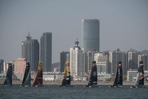 Extreme Sailing Series fleet races during day one of Act 2 in Qingdao, China photo copyright  Xaume Olleros / OC Sport taken at  and featuring the  class