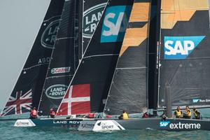 Act 2, Extreme Sailing Series Qingdao - Day 1 - Land Rover BAR Academy and SAP Extreme Sailing Team go head to head during a race photo copyright  Xaume Olleros / OC Sport taken at  and featuring the  class