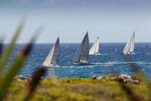 The Peters & May Round Antigua Race started off Fort Charlotte, Antigua and is an optional race, scored separately from the full week's racing and provides crews with an opportunity to tour Antigua's stunning coastline photo copyright Paul Wyeth / www.pwpictures.com http://www.pwpictures.com taken at  and featuring the  class