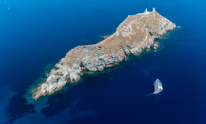 Caro, a Botin 65, negotiates the Giraglia Rock, the race's symbolic landmark – Giraglia Rolex Cup ©  Rolex/ Kurt Arrigo http://www.regattanews.com