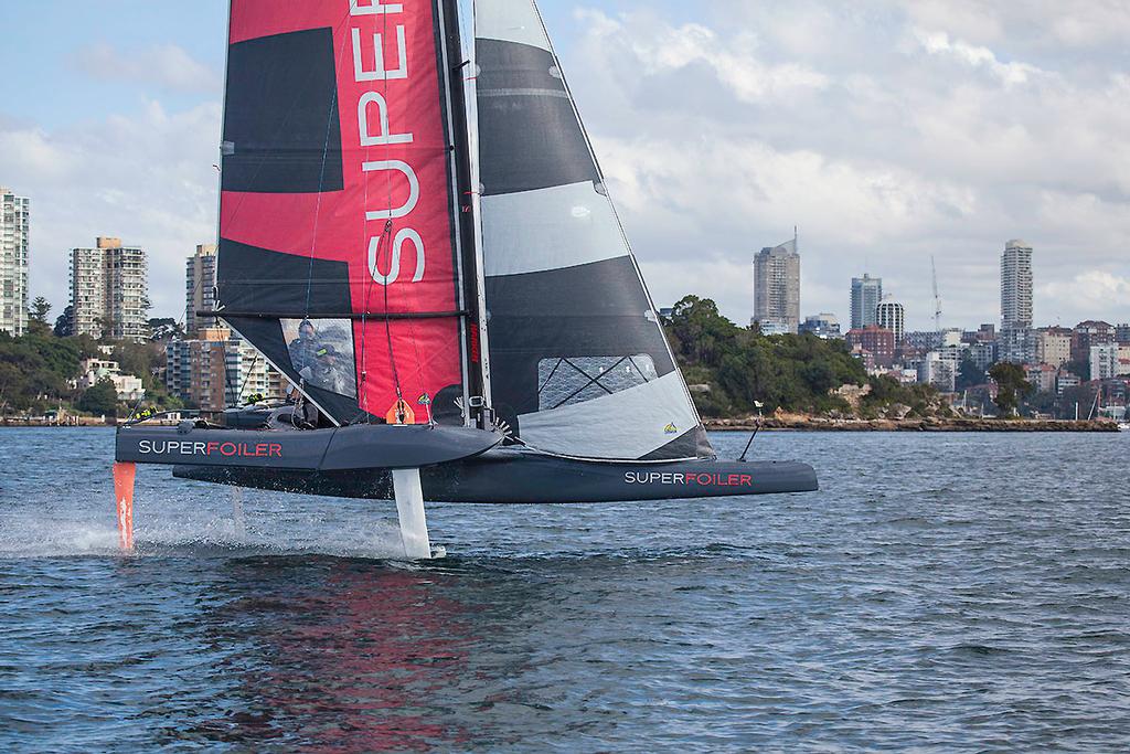 Powering along near Clark Island on Sydney Harbour - SuperFoiler Grand Prix photo copyright  John Curnow taken at  and featuring the  class
