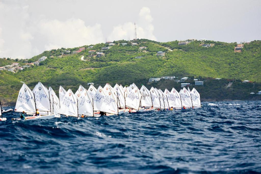 Islands in the background add to the tropical setting of the IOR/EMS, sailed out of the St. Thomas Yacht Club, in the U.S. Virgin Islands. © Dean Barnes www.deanbarnesphoto.com