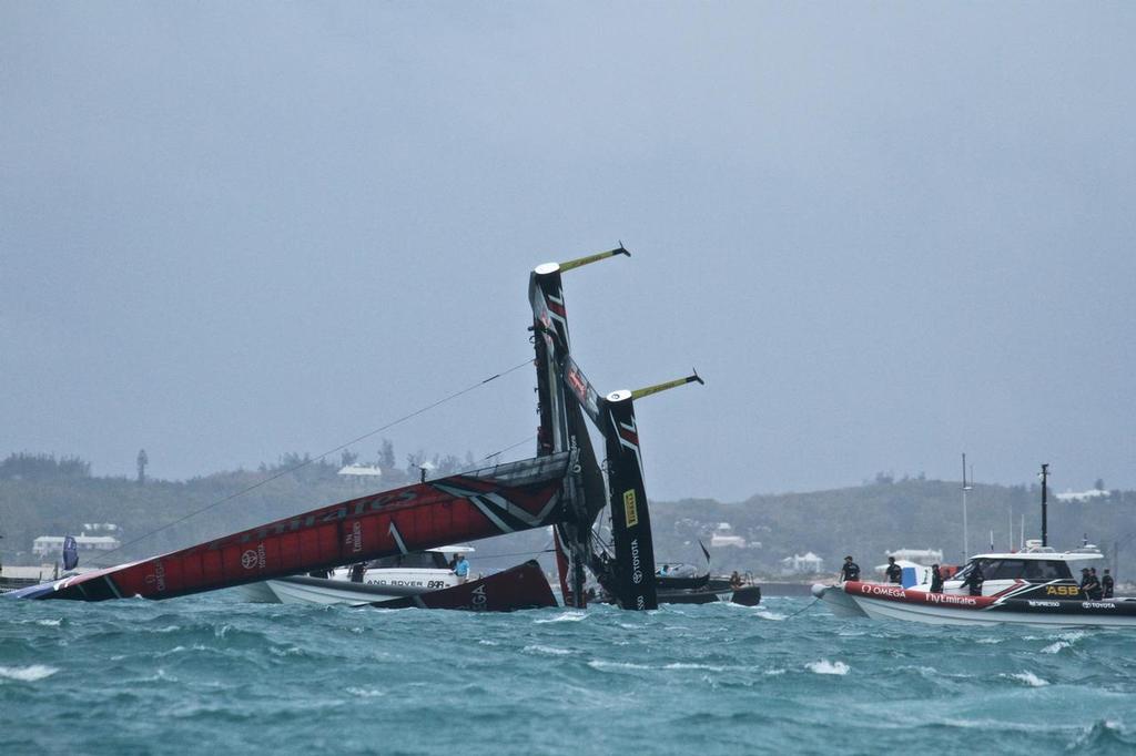 Emirates Team New Zealand is manoeuvred into a position where  she can be righted - Semi-Final, Day 11 - 35th America's Cup - Bermuda  June 6, 2017 photo copyright Richard Gladwell www.photosport.co.nz taken at  and featuring the  class