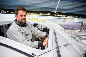 François Gabart and his crew concentrating on the start of The Bridge photo copyright  Vincent Curutchet / DPPI / Macif taken at  and featuring the  class