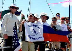John Levinson (Center) and crew show off their Line Honors banner at the Royal Hamilton Amateur Dinghy Club. ‘Jambi’, a new Hinckley Bermuda 50 crossed the finish line off St. David’s Lighthouse at 12:47:00 ADT to take line honors in the 40th Anniversary Marion Bermuda Race.  ‘Jambi’ had an unofficial elapsed time of 4 days 22 hours 52 minutes 11 seconds. Based on her starting time of 12:55 EDT on June 9, that is 118 hours 52 minutes and 11 Seconds. photo copyright Talbot Wilson taken at  and featuring the  class