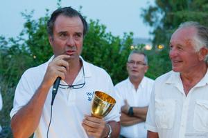 Joaquín Blanco receives the Finn Gold Cup from Finn Class President of Honour Gerardo Seeliger photo copyright  Robert Deaves taken at  and featuring the  class