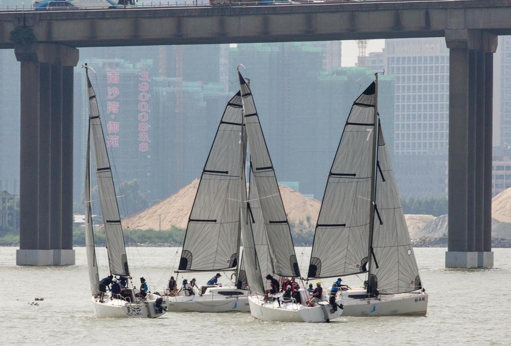 Close racing at the windward mark. Guangzhou Nansha International Sailing Regatta 2017. © Guy Nowell http://www.guynowell.com