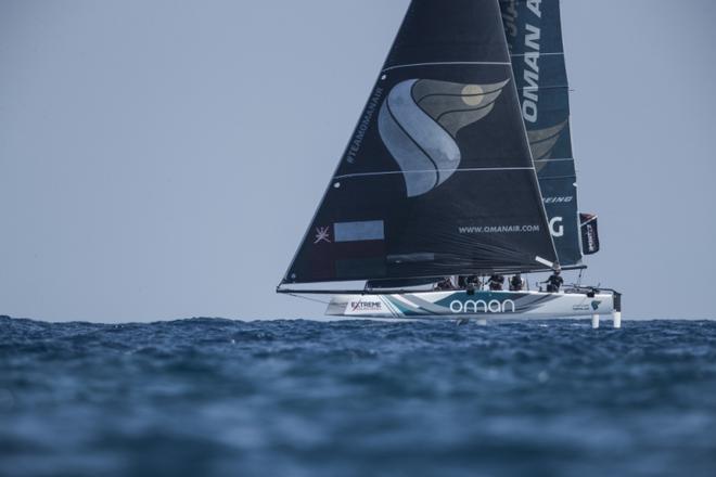 Extreme Sailing Series Barcelona - Act 4 – Oman Air Sailing Team skippered by Phil Robertson with team mates Pete Greenhalgh, Ed Smyth, Nasser Al Mashari and James Wierzbowski racing close to the city of Barcelona on day 3 of racing ©  Lloyd Images