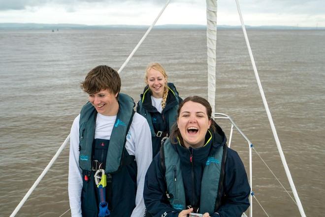 Alisha, George and Abbie on the bow of Moonspray © Ellen MacArthur Cancer Trust