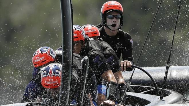Peter Burling steers Team New Zealand during the America's Cup. © SW