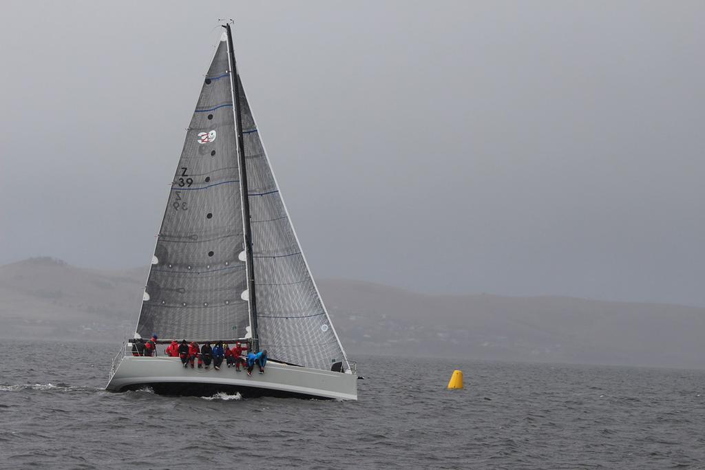 Division 1 overall winner Wild West powers to the weather mark on a murky day on the Derwent. - BYC Hobart Jaguar Winter Series 2017 photo copyright Peter Watson taken at  and featuring the  class