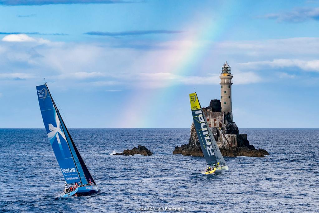 Team Brunel, Sail No: NED 0, Class: Volvo 65, Owner: Volvo Ocean Race, Type: VOR 65 Vestas 11th Hour Racing, Sail No: USA 0, Class: Volvo 65, Owner: Volvo Ocean Race, Type: VOR 65 rounding the Fastnet Rock ©  Rolex / Carlo Borlenghi http://www.carloborlenghi.net