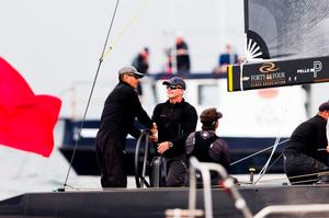 Team Nika's owner Vladimir Prosikhin and tactician Terry Hutchinson shake hands after another race win – RC44 Marstrand World Championship photo copyright  Pedro Martinez / Martinez Studio / RC44 taken at  and featuring the  class