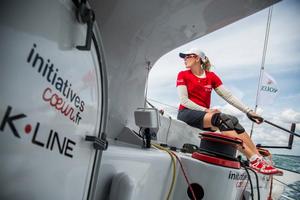 Sam Davies racing on Tanguy de Lamotte's IMOCA 60 Initiatives Coeur approaches Land's End – Rolex Fastnet Race photo copyright  Initiatives Coeur taken at  and featuring the  class