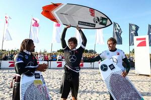 Keahi de Aboitiz is the first 'Strapless Tow-Up Big Air' comp champion, flanked by Airton Cozzolino and Ralph Boelen photo copyright  Joern Pollex taken at  and featuring the  class