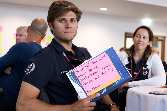 Sailor Tom Johnson make his pledge to protect the ocean, team member, Hannah Diamond looks on © Vestas 11th Hour Racing