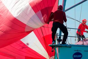 On the bow of Mach 1 – SeaLink Magnetic Island Race Week photo copyright  Andrea Francolini / SMIRW taken at  and featuring the  class