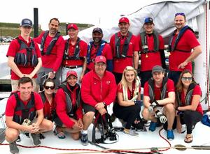 Some of the US 42 sailors in their red uniforms gathered before the intramural race on Saturday in Newport Harbor photo copyright Manhattan Yacht Club taken at  and featuring the  class