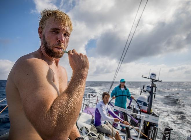 Leg 1 – Alicante to Lisbon, First Morning onboard team AkzoNobel, Kiwi sailor Brad Ferrand brushes his teeth after waking up from his 2 hour sleep – Volvo Ocean Race ©  Konrad Frost / Volvo Ocean Race