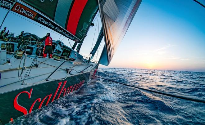 Leg 1, Day 4 – Alicante to Lisbon, sunset onboard Sun Hung Kai/Scallywag. Happy days – Volvo Ocean Race ©  Jeremie Lecaudey / Volvo Ocean Race