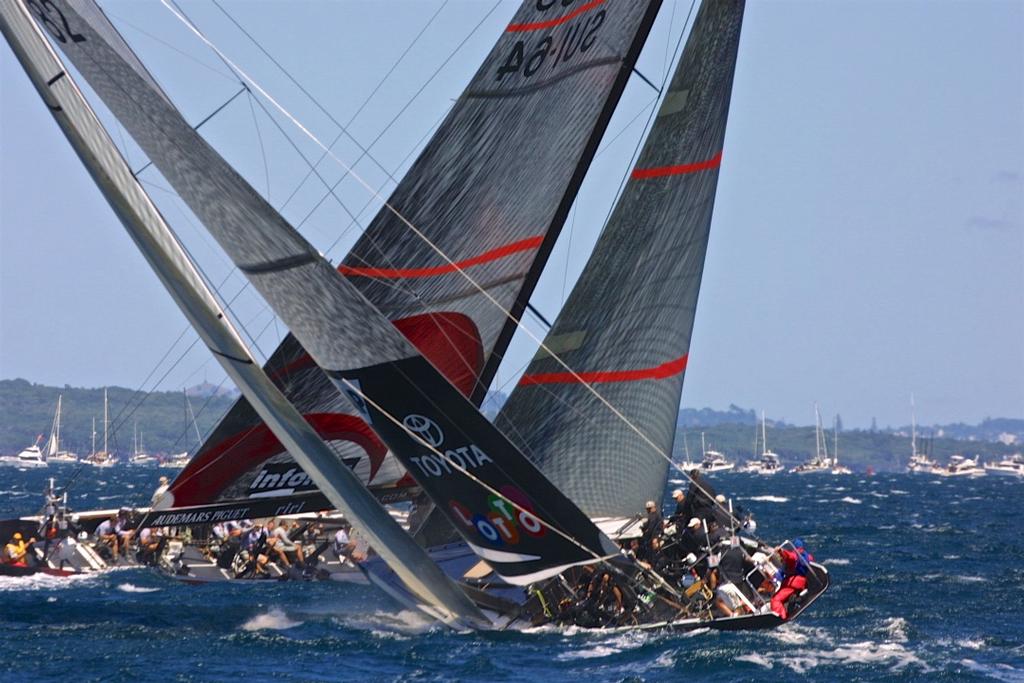 Alinghi crosses in front of Team New Zealand on the first leg of Race 1 of the 2003 America's Cup - photo © Bob Greiser/America's Cup