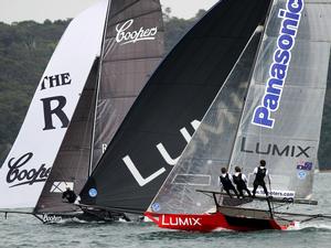 Panasonic Lumix and Coopers-Rag and Famish Hotel continued their battle downwind – 18ft Skiffs Spring Championship photo copyright  Frank Quealey / Australian 18 Footers League taken at  and featuring the  class