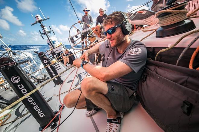 Day 10, Leg 2, Lisbon to Cape Town, sunrise on board Dongfeng. First live ever done between two skippers: Charles and Xavi talking to each other. 14 November ©  Jeremie Lecaudey / Volvo Ocean Race