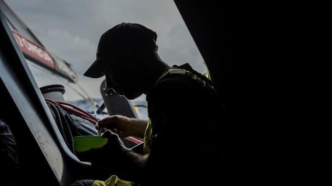 Day 12, Leg 2, Lisbon to Cape Town, Maciel Cicchetti settles down to have some breakfast, 16 November, 2017 – Volvo Ocean Race ©  Rich Edwards / Volvo Ocean Race