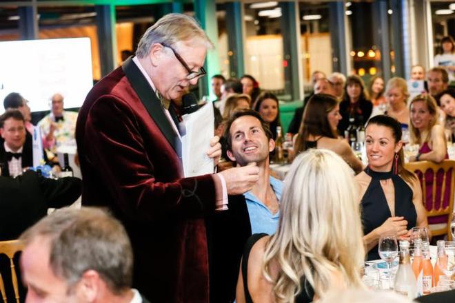 The esteemed auctioneer Nick Bonham took a tenner off Sir Ben Ainslie and made £60 with it! © Paul Wyeth