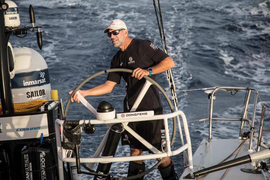 Volvo Ocean Race 2017/18 - Leg 01, Alicante to Lisbon. Stuart Bannatyne on the helm of Dongfeng enroute to the waypoint. 26 October, 2017 ©  Rich Edwards / Volvo Ocean Race