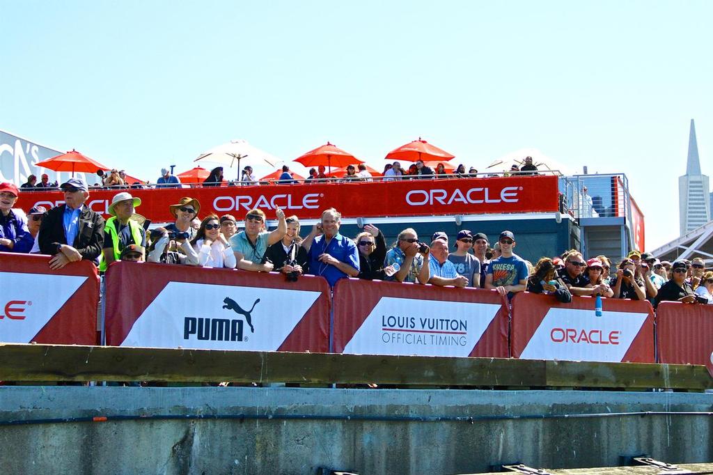 San Francisco - Fans crowd the waterfront with the America’s Cup Village behind.  © Richard Gladwell www.photosport.co.nz