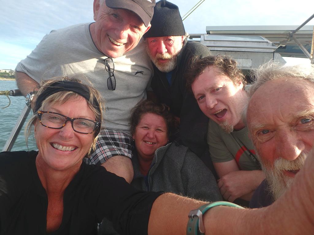 A tired but happy crew, back in Australia – Clockwise from top left: Skipper Tony, Keith, Max, Brian, Karen and yours truly,A tired but happy crew, back in Australia – Clockwise from top left: Skipper Tony, Keith, Max, Brian, Karen and yours truly © Kristen Anderson