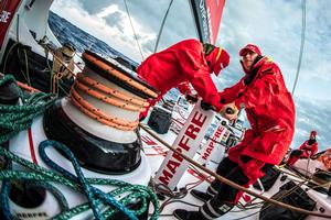 Day 4, Leg 2 – Lisbon to Cape Town, on board MAPFRE, Xabi Fernandez y Tamara Echegoyen en un pedestal trimando velas – Volvo Ocean Race photo copyright  Ugo Fonolla / Volvo Ocean Race taken at  and featuring the  class