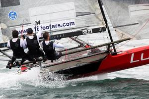The Panasonic Lumix team drove their skiff hard downwind to win Race 1 photo copyright  Frank Quealey / Australian 18 Footers League taken at  and featuring the  class