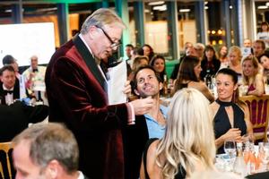 The esteemed auctioneer Nick Bonham took a tenner off Sir Ben Ainslie and made £60 with it! photo copyright Paul Wyeth taken at  and featuring the  class