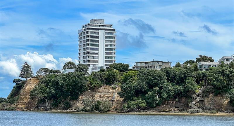 A small section of the extensive slip damage around Stanley Point - the exposed part of the cliffs were previously covered with trees which are now debris at the bottom  and get washed out the outgoing tide photo copyright Richard Gladwell / Sail-World.com taken at Royal New Zealand Yacht Squadron and featuring the  class